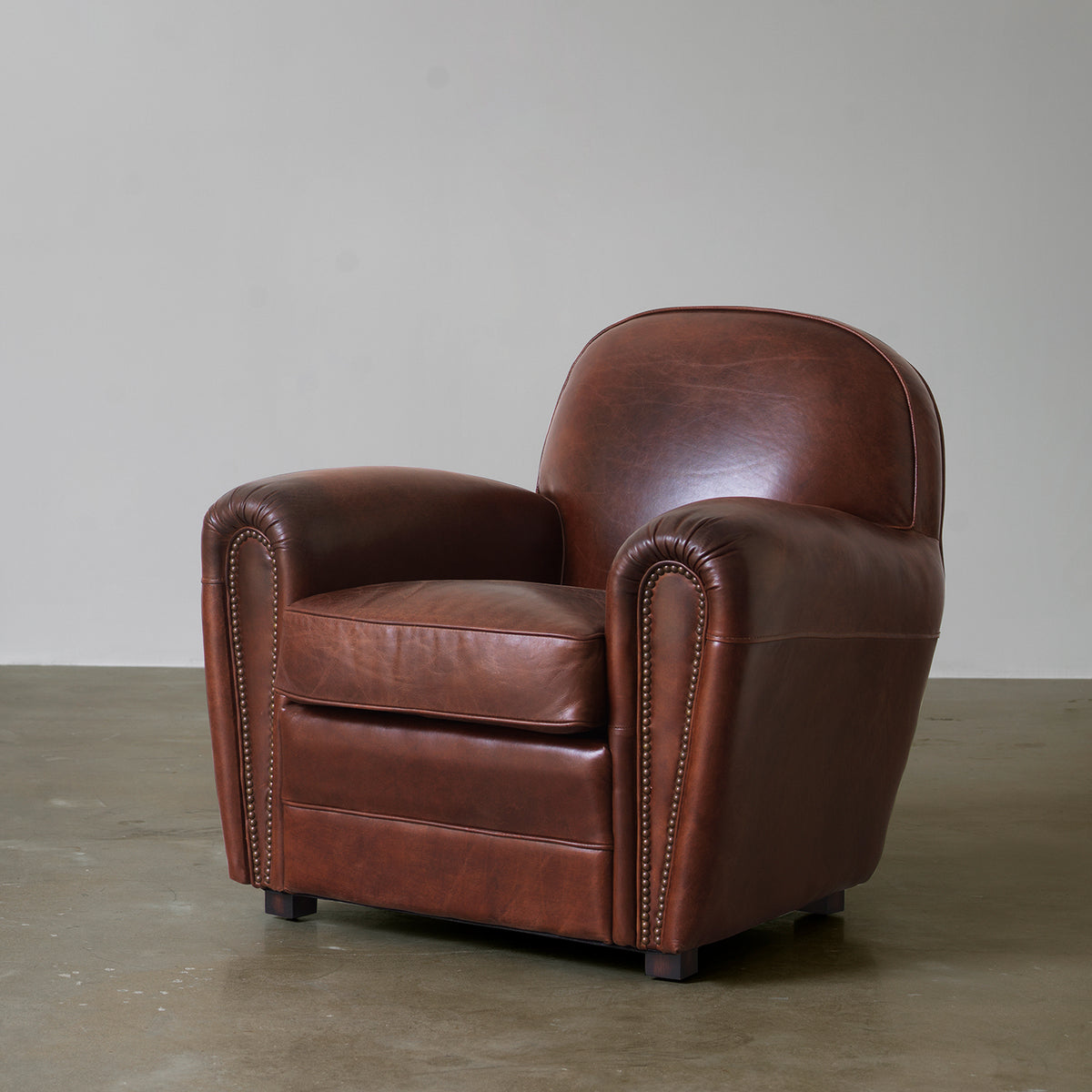 Vintage brown cowhide leather club chair with pine wood frame
