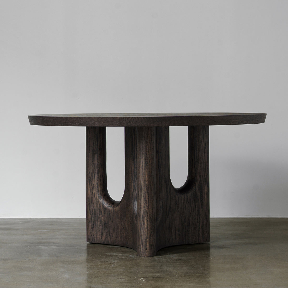 Vintage Distressed Round Dining Table with Sculptural Cutout Pedestal Base