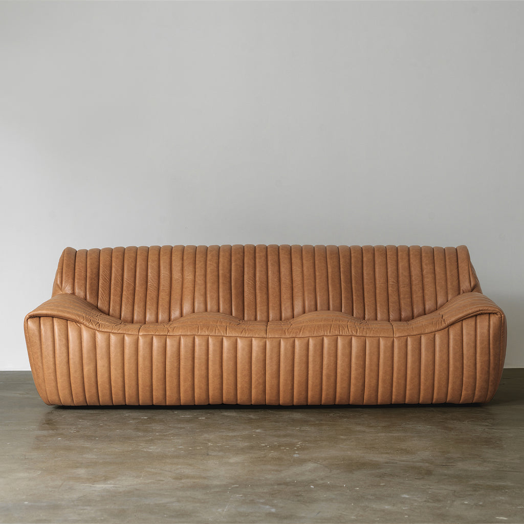 Sculptural Channel-Tufted Sofa — Caramel Brown