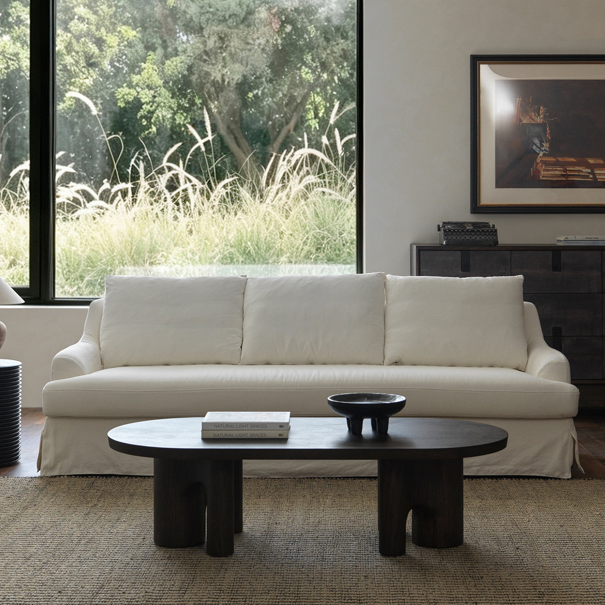 1057 Relaxed Skirted Sofa with Sloping Arms — Ivory
