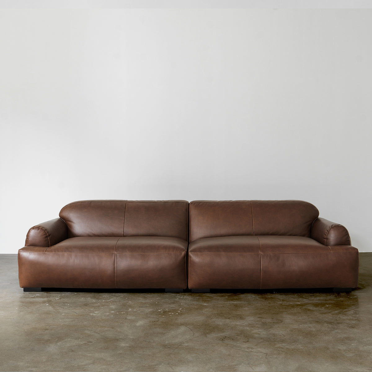 Contemporary Low-Profile Sofa with Rounded Arms — Brown
