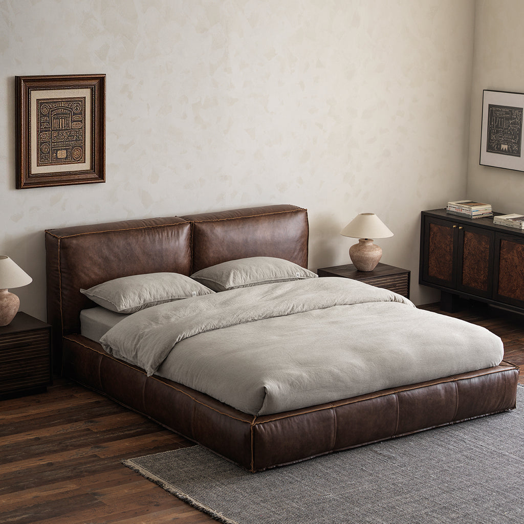 Vintage oil-waxed leather upholstered bed in bedroom