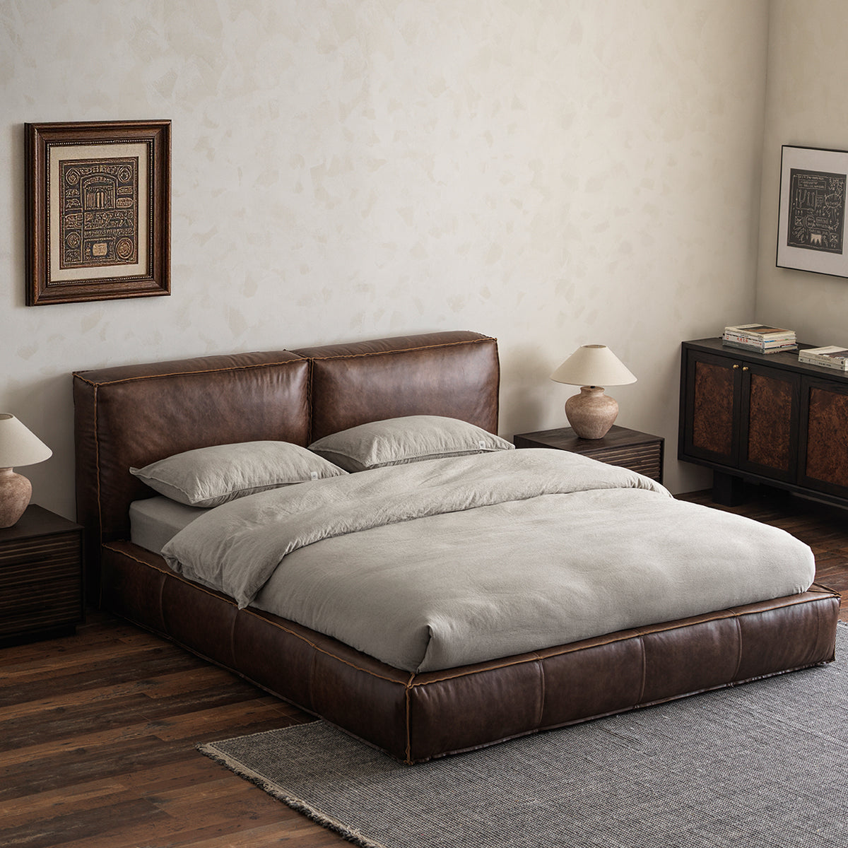 Vintage oil-waxed leather upholstered bed in bedroom