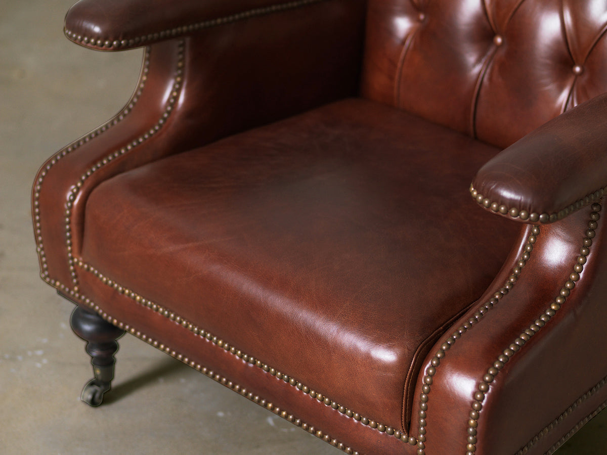 Hand-rubbed cowhide leather seat and arm detail