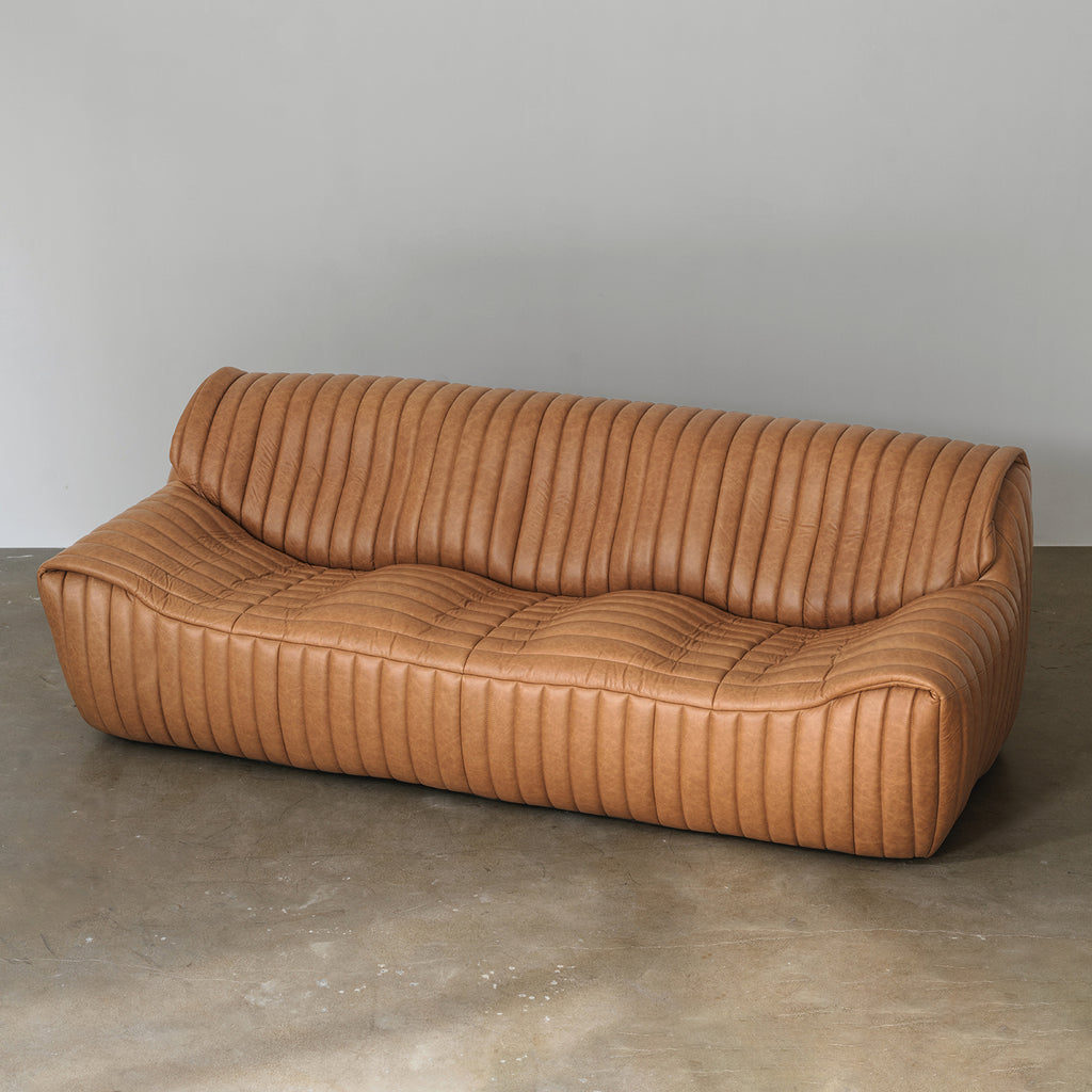 Sculptural Channel-Tufted Sofa — Caramel Brown