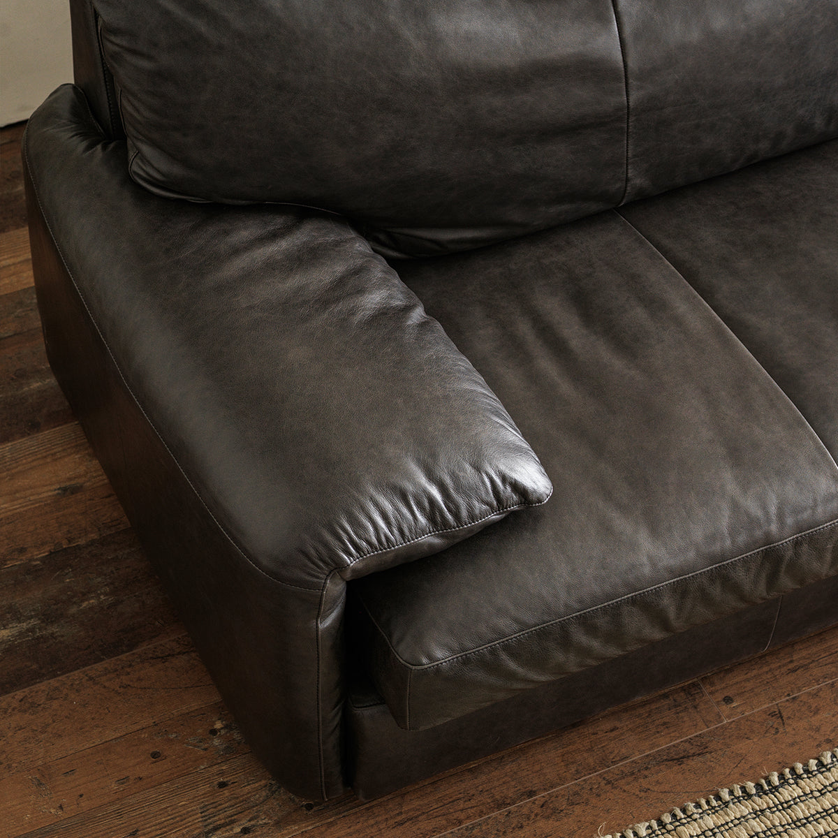 Low-Profile Sofa with Padded Arms — Charcoal Black