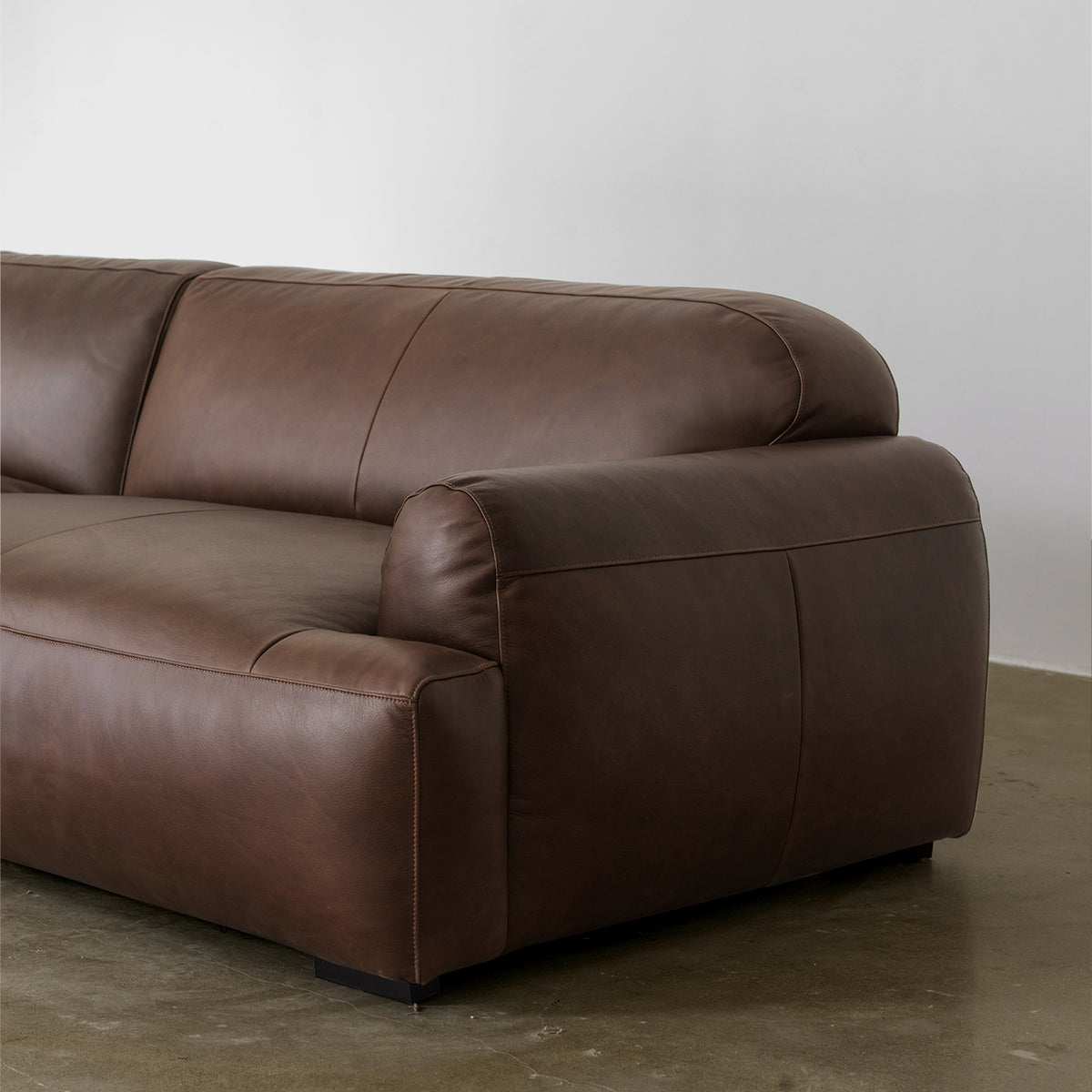 Contemporary Low-Profile Sofa with Rounded Arms — Brown