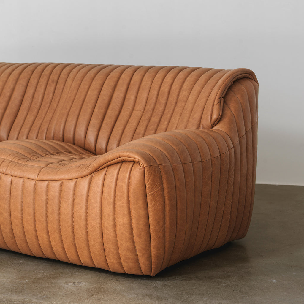 Sculptural Channel-Tufted Sofa — Caramel Brown