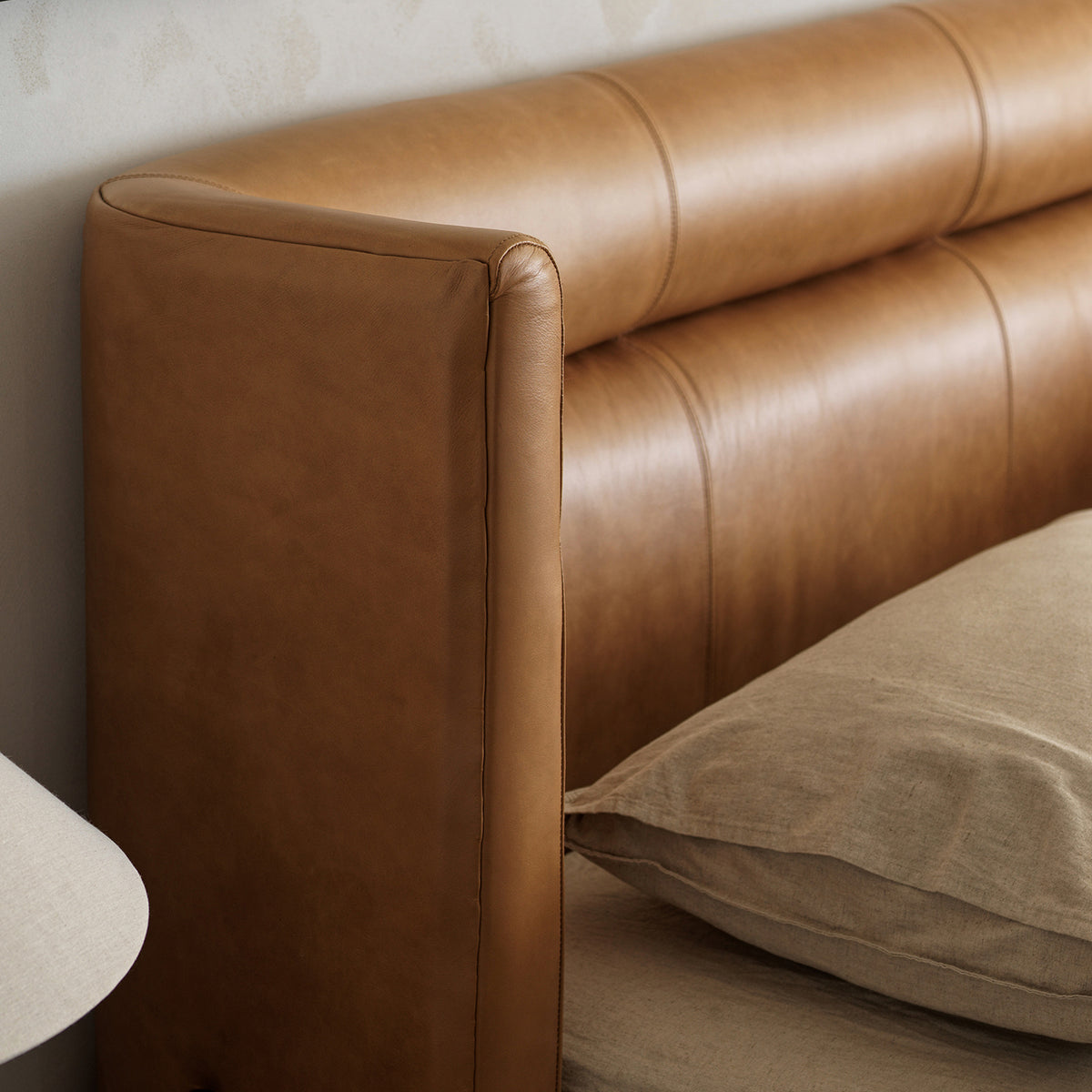 Vintage oil-waxed cowhide leather padded headboard detail
