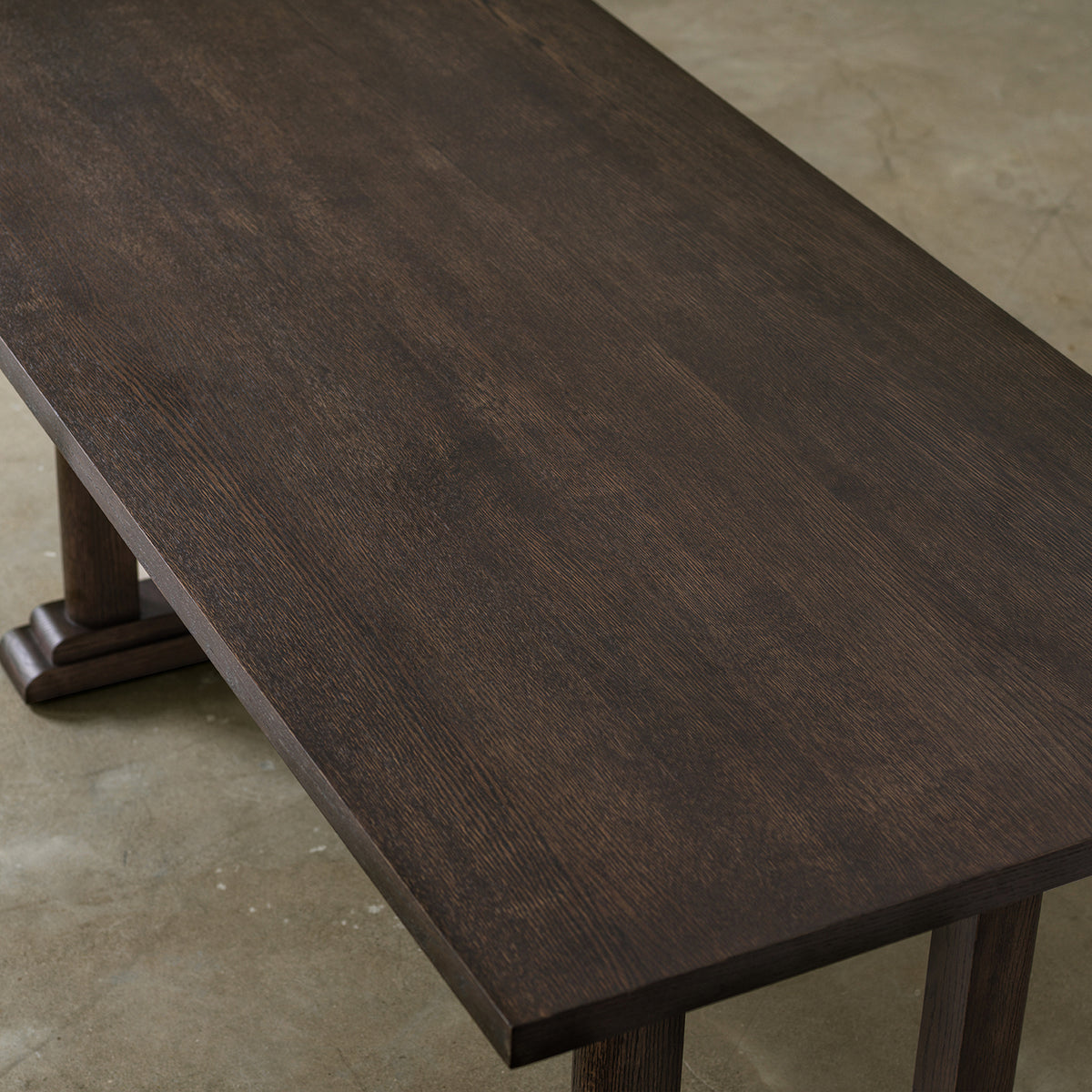 Sturdy multi-layer wood base of rustic dining table detail view