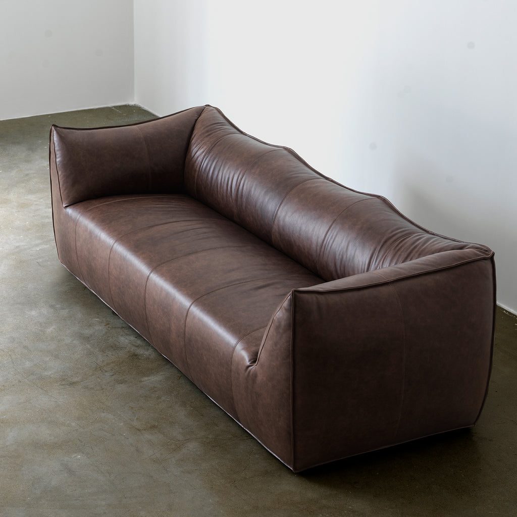 Vintage oil-waxed leather sofa three-quarter view