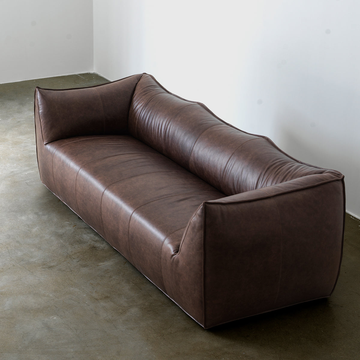 Vintage oil-waxed leather sofa three-quarter view