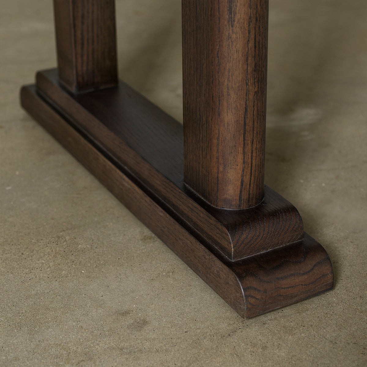 distressed wood dining table used as a writing desk in dining room setting