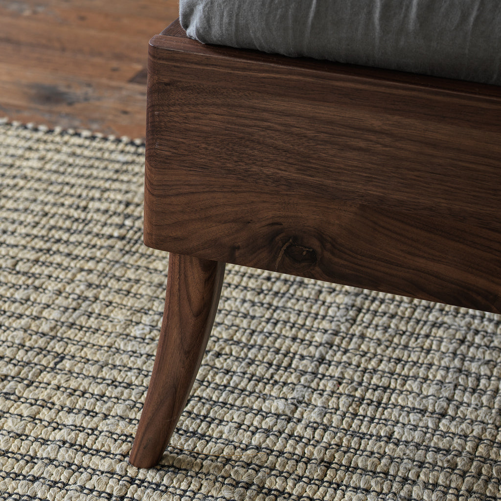 Solid American black walnut bed frame and tapered leg detail