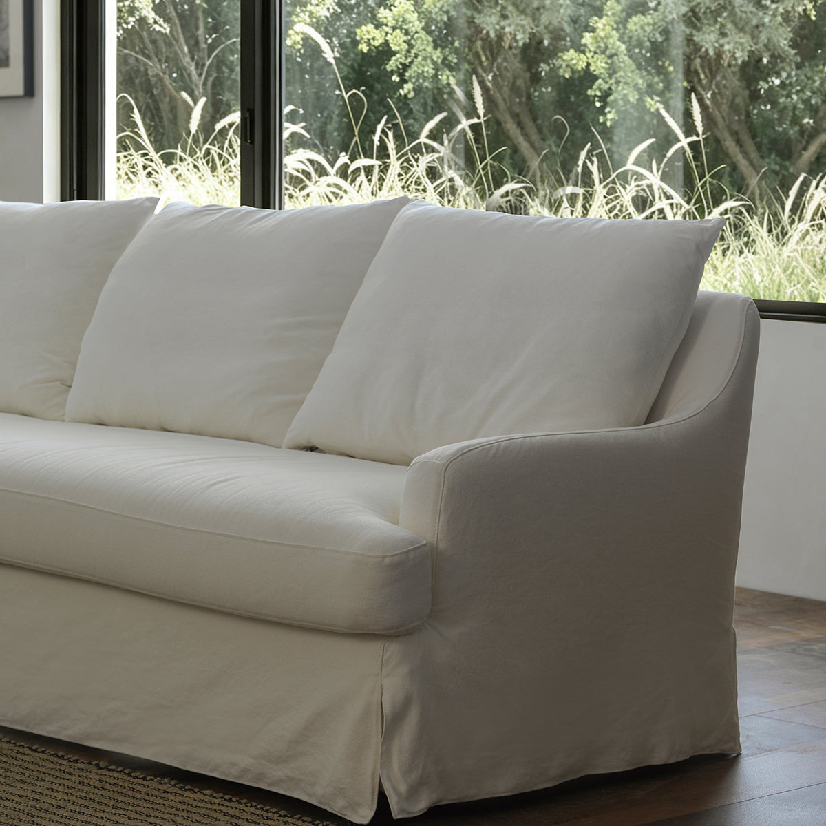 1057 Relaxed Skirted Sofa with Sloping Arms — Ivory