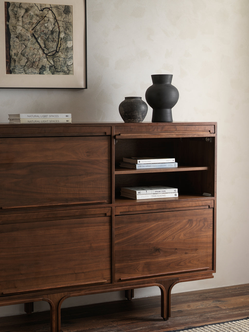 Walnut storage cabinet with drawers and drop-down doors open
