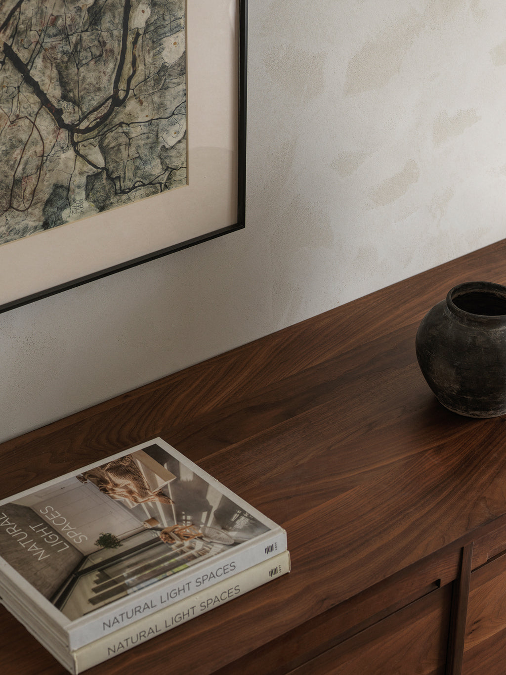 Black walnut sideboard in modern living room interior