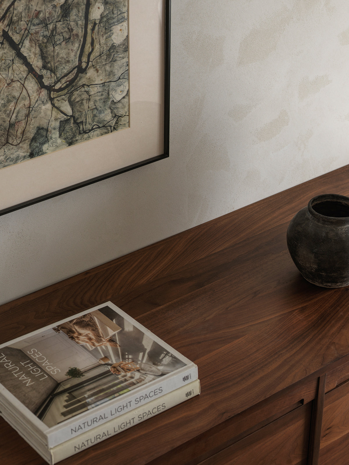 Black walnut sideboard in modern living room interior