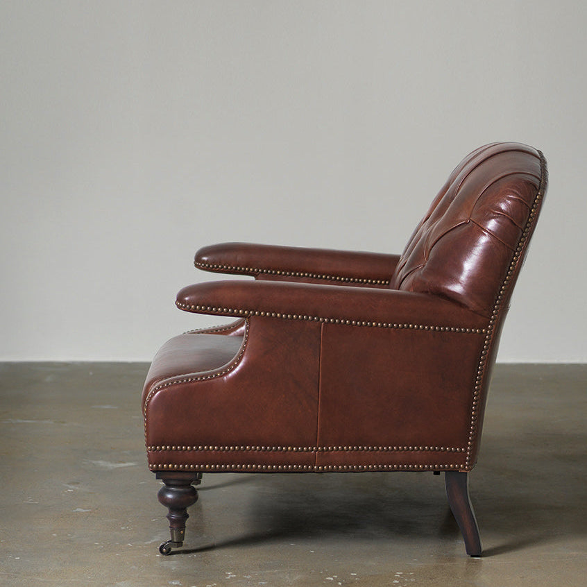Vintage leather club chair side view