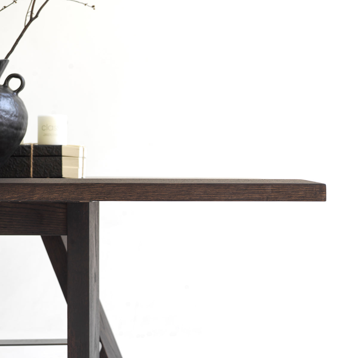 Detail view of solid red oak dining table leg joint and heavy-duty structural frame