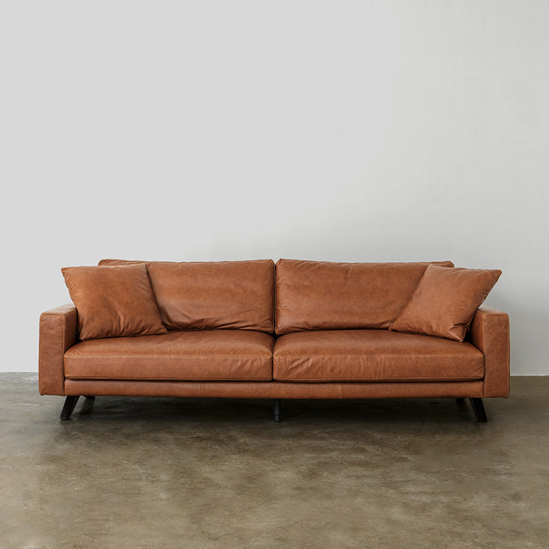 century genuine cowhide leather sofa in warm brown with angled wood legs