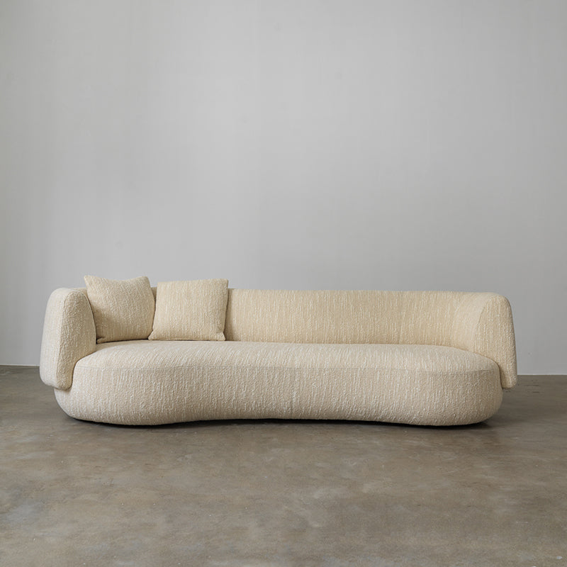 Palo curved cream textured fabric sofa front view