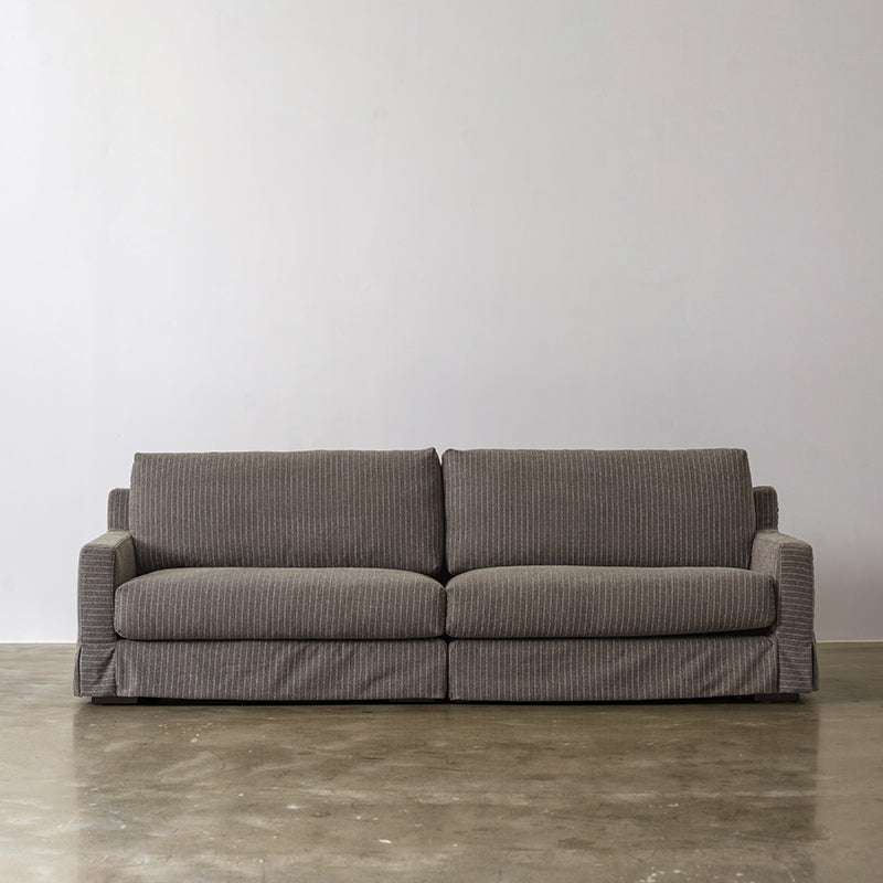 Warm gray linen sofa with removable covers front view