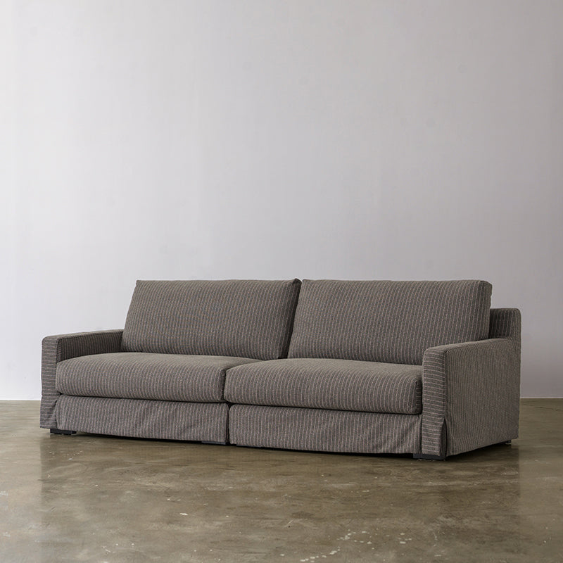 Warm gray linen sofa three-quarter view
