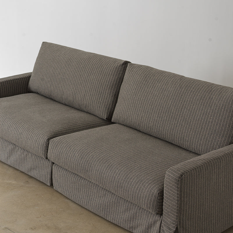 Linen sofa with down and foam seat cushions detail