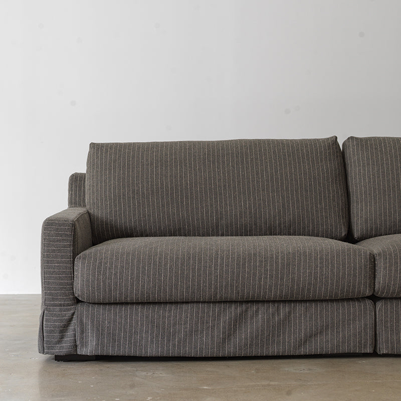 Warm gray linen sofa front view with removable cushions